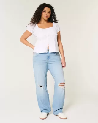 Zerrissene, lockere Straight-Jeans mit niedriger Taille und heller Waschung
