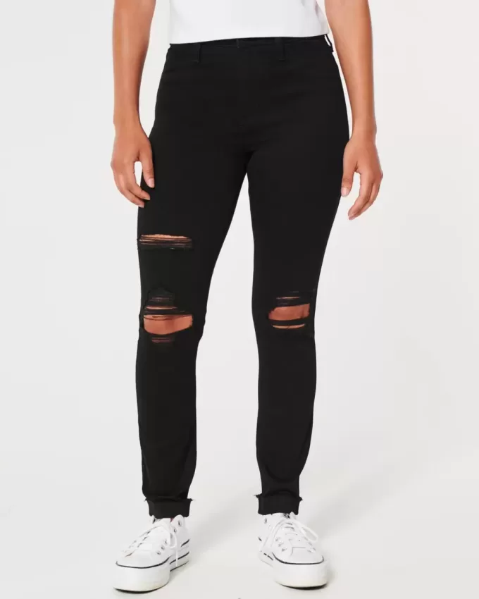 Zerrissene schwarze Jeans-Leggings mit hohem Bund