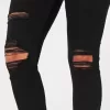 Zerrissene schwarze Jeans-Leggings mit hohem Bund