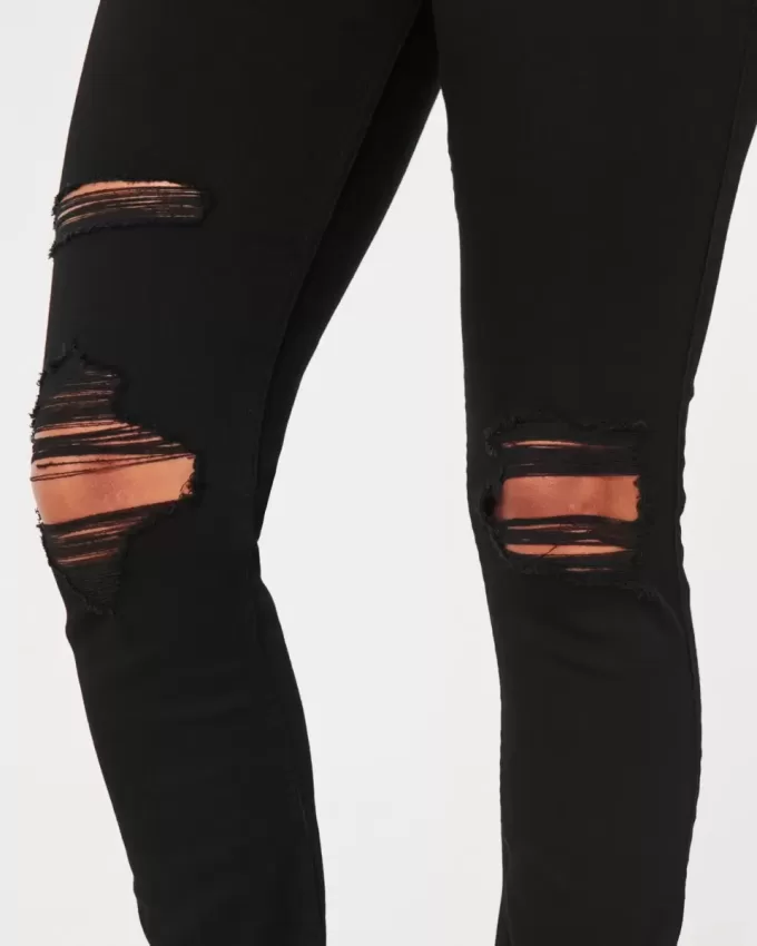 Zerrissene schwarze Jeans-Leggings mit hohem Bund