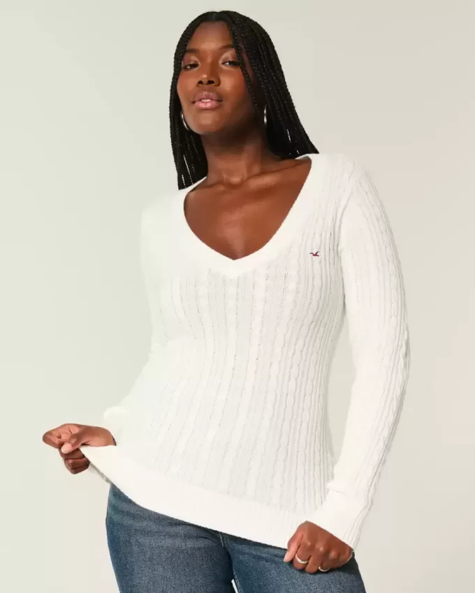 Zopfmuster-Pullover mit V-Ausschnitt und Symbol