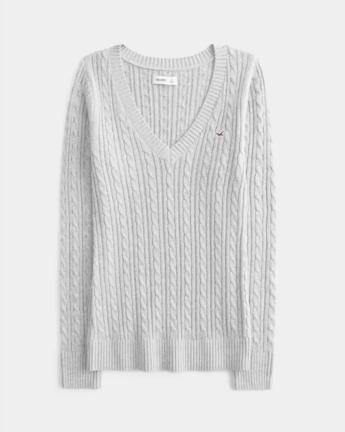 Zopfmuster-Pullover mit V-Ausschnitt und Symbol