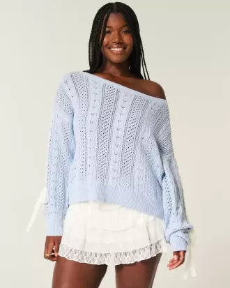 Zopfmusterpullover mit Schleifenärmeln
