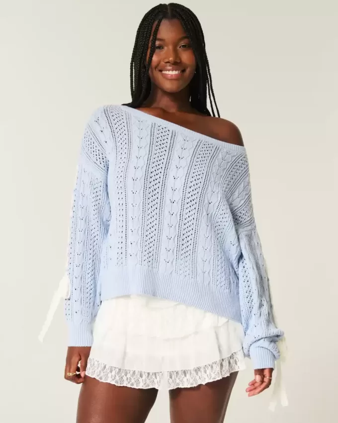 Zopfmusterpullover mit Schleifenärmeln